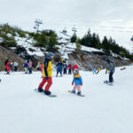 Experimente seu batismo de esqui/snowboard na neve em Cerro Catedral